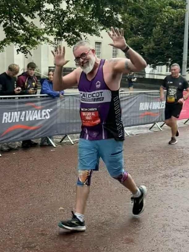man running and smiling