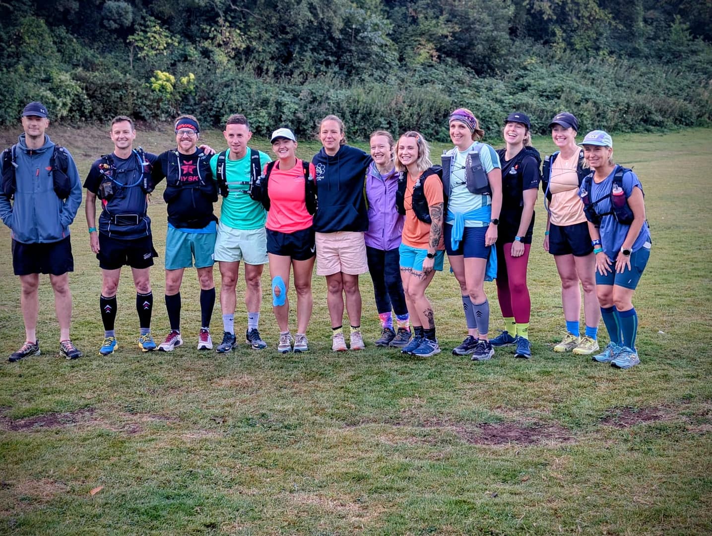 group of ultra runners smiling