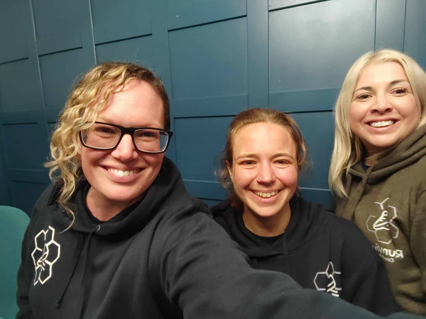 Three women smiling
